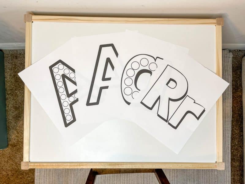 White coloring pages with the letters A and R