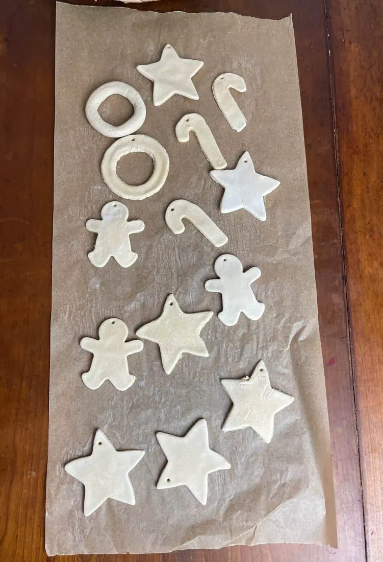 Dried salt dough ornaments on parchment paper